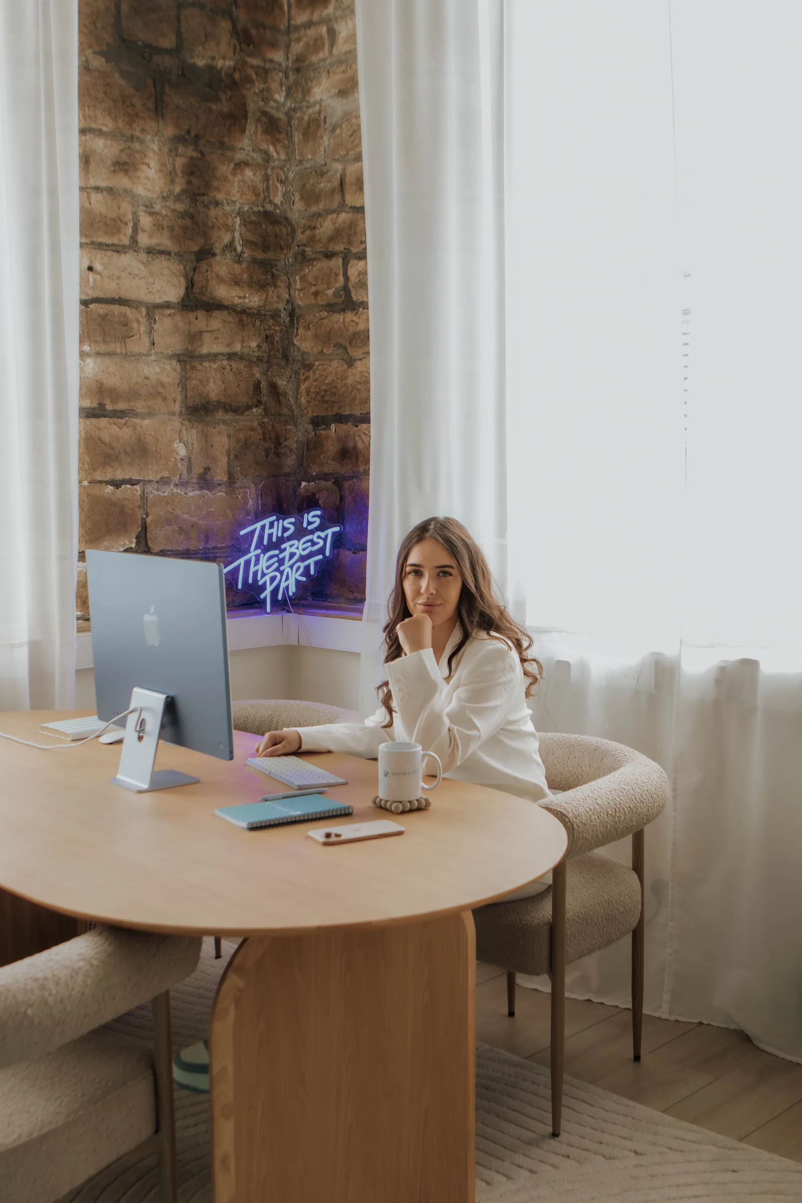 Hannie at her desk in the Hannie & Co Financial office